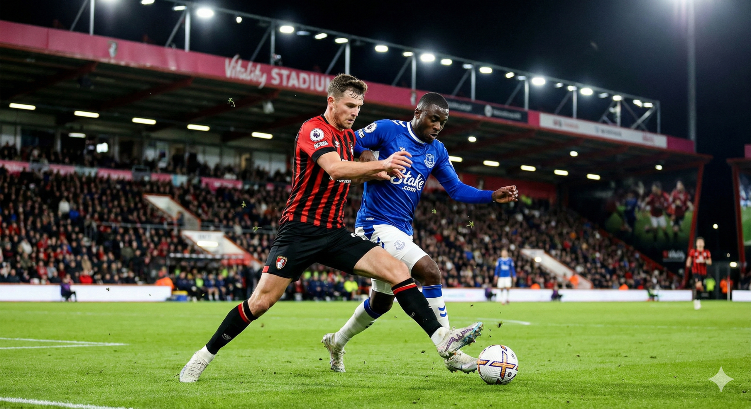 Sebuah gambar dinamis yang menampilkan aksi pertandingan sepak bola antara Bournemouth (The Cherries) dan Everton (The Toffees). Fokus utama adalah dua pemain dari masing-masing tim yang sedang berjuang memperebutkan bola di tengah lapangan. Pemain Bournemouth mengenakan seragam merah-hitam tradisional mereka, sementara pemain Everton mengenakan seragam biru khas. Latar belakang harus menunjukkan stadion yang penuh (Vitality Stadium), dengan cahaya lampu sorot yang terang benderang, menciptakan suasana pertandingan malam hari yang intens dan penuh semangat, sesuai dengan prediksi pertandingan yang ketat ini.